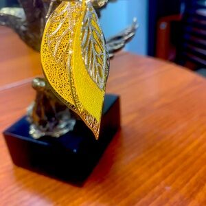 Lightweight gold leaf teardrop earrings.